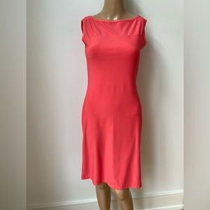 Knee length sleeveless sheath dress